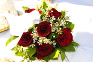 Beautiful bouquet of roses and matching boutonniere