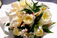 Beautiful bouquet of roses and matching boutonniere