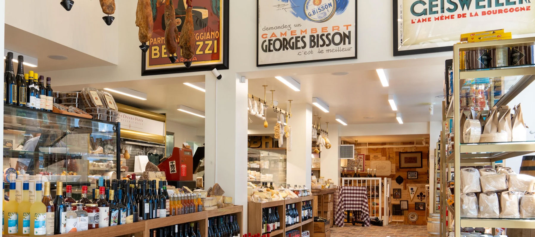 Shelves of cheese and specialty foods inside The Cheese Store of Beverly Hills
