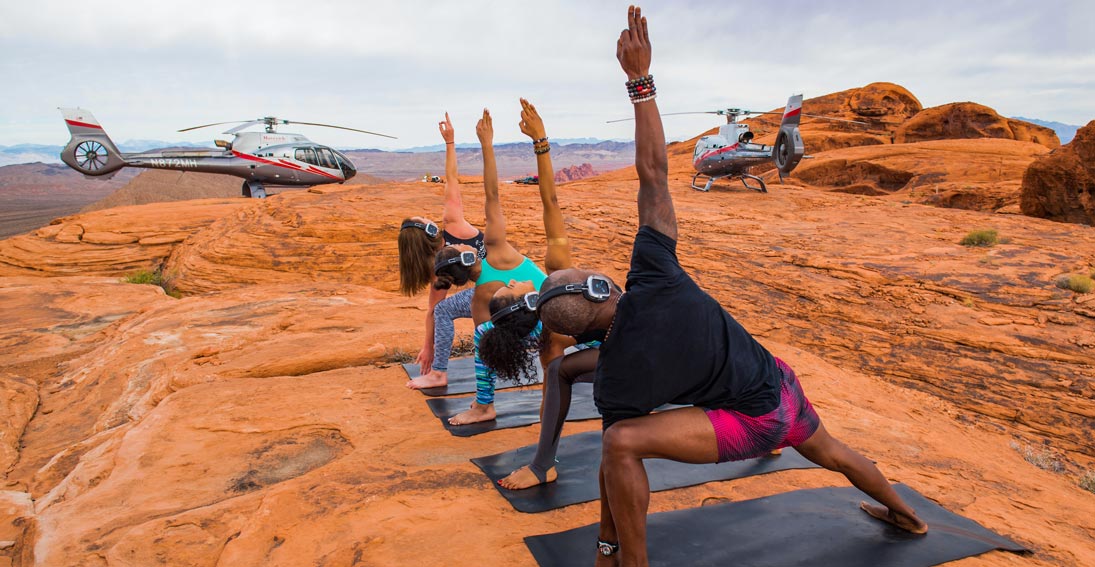 A private helicopter charter with yoga inside the Valley of Fire