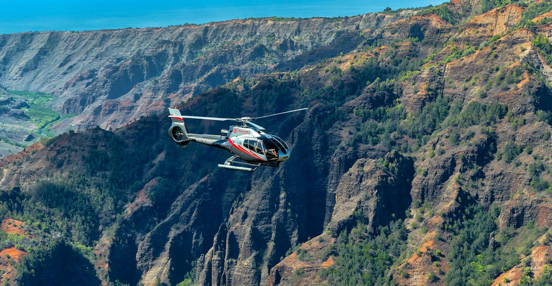 Time for a picture when flying Kauai's coastline on your helicopter tour