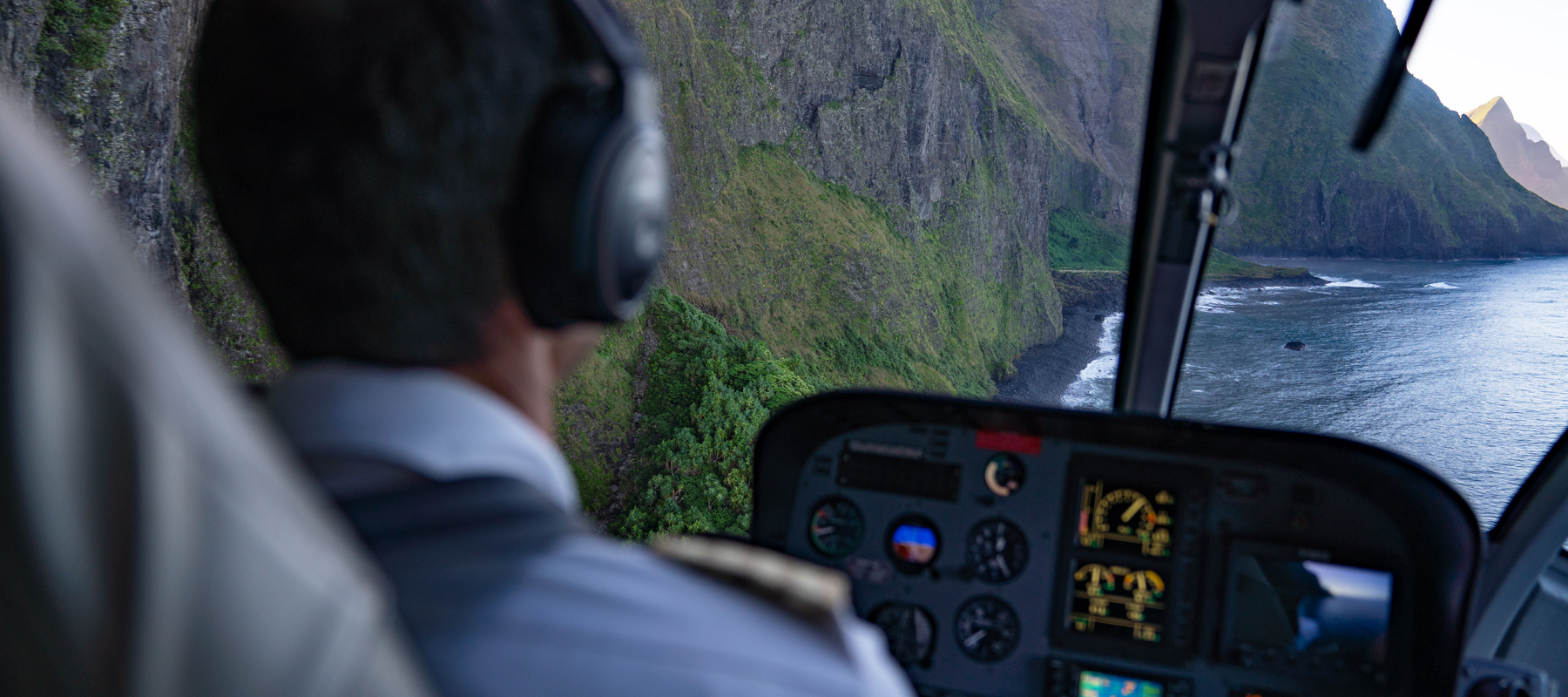 A beautiful view from inside an Airbus 130 helicoptersr of Molokai’s towering sea cliffs