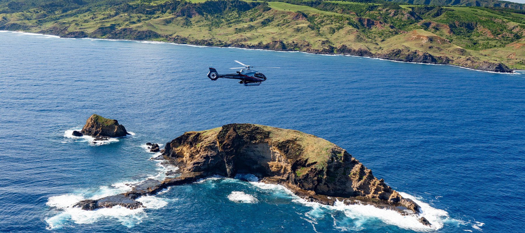 Elephant Rock rising from the Pailolo Channel between Maui and Molokai