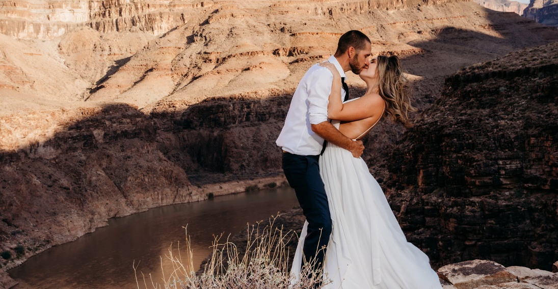Beautiful bride and groom celebrate their nupitals at the Grand Canyon